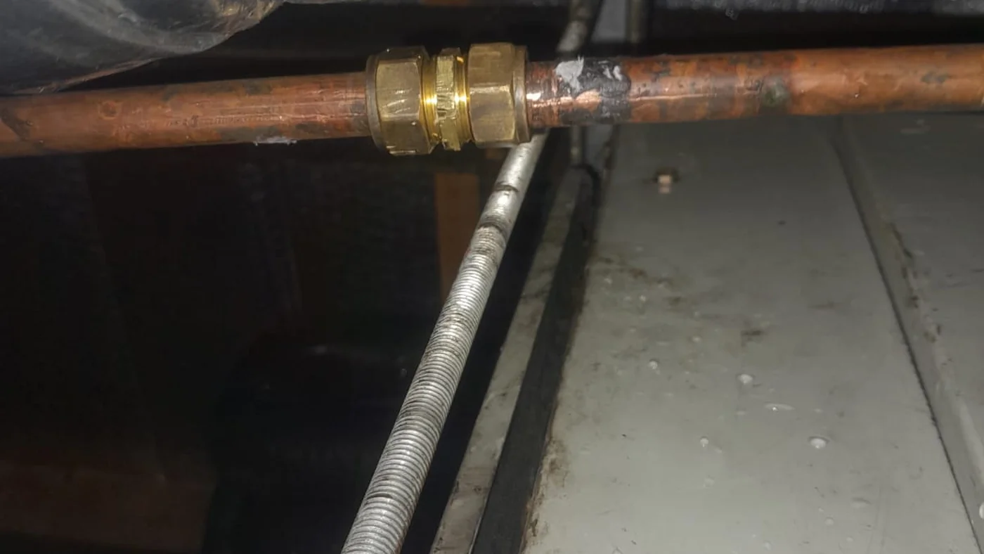 Trusted Plumber Fonteine Fast Local Plumbing — Fonteine plumbing call-out Licensed plumber inspecting pipework and fixtures during a service visit in Fonteine — leaks, drains, geysers and emergency repairs assessed on site