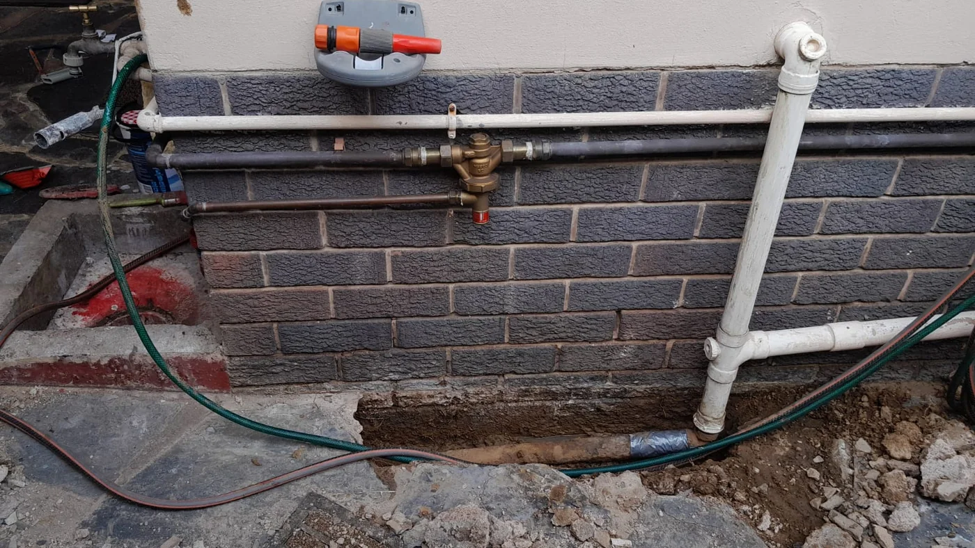 Tubase Plumbers Reliable Local Service — Tubase plumbing call-out Licensed plumber inspecting pipework and fixtures during a service visit in Tubase — leaks, drains, geysers and emergency repairs assessed on site
