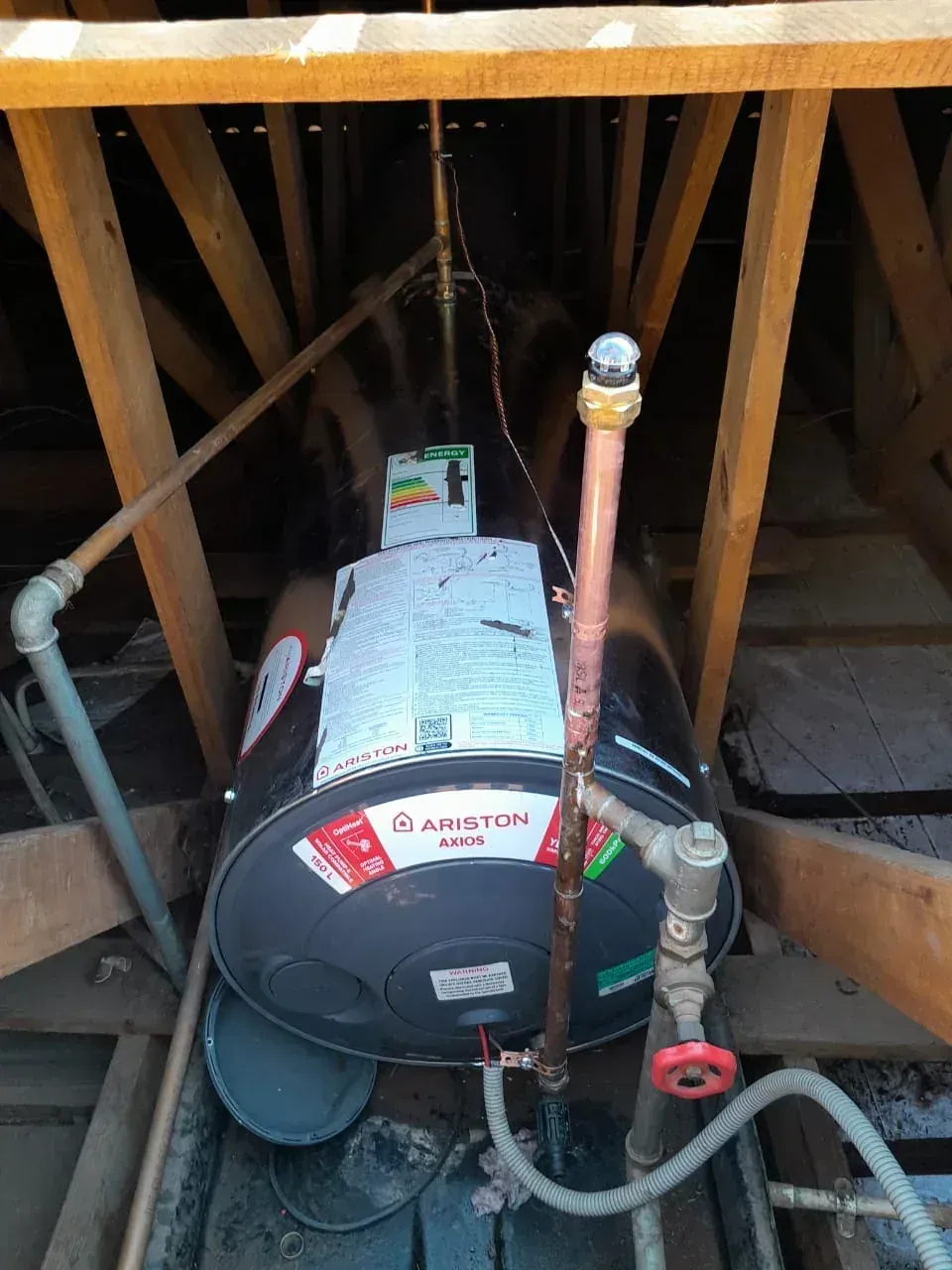 Electric geyser installed safely in a roof space