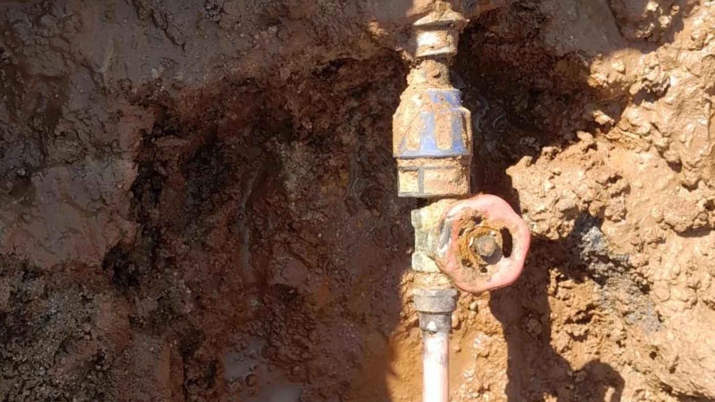Affordable Plumber Clydesdale Repairs Installations — Clydesdale plumbing call-out Exposed underground water connection and shut-off valve during plumbing work in Clydesdale