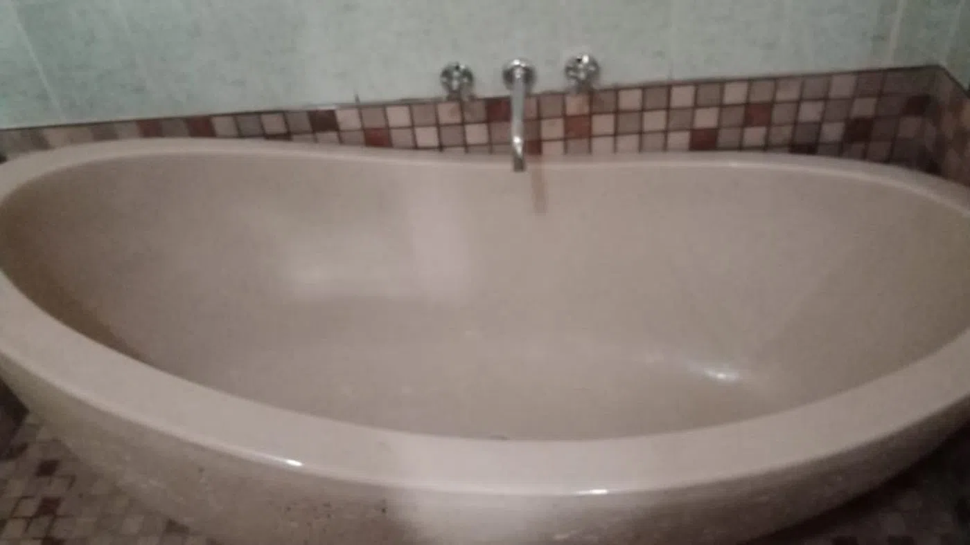 Plumber attending a plumbing call-out in Bryanston Plumber attending a plumbing call-out in Bryanston