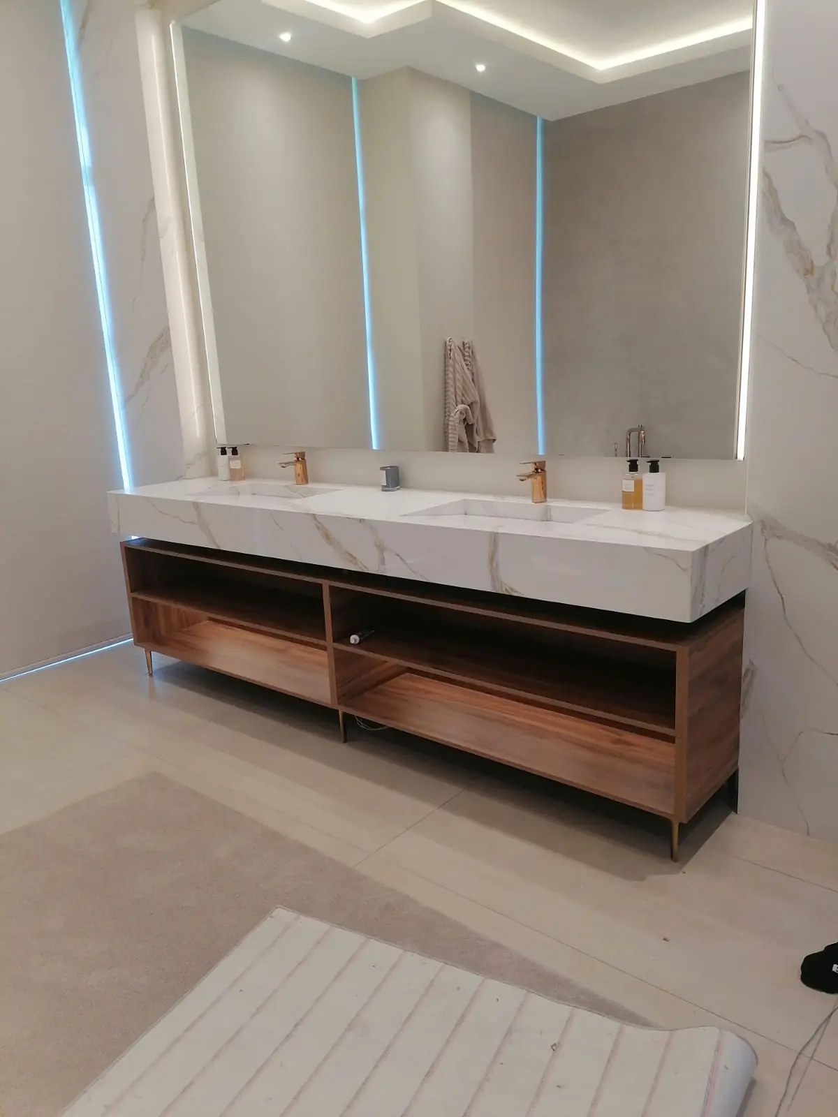 Basin and vanity plumbing with isolation valves in a renovated bathroom