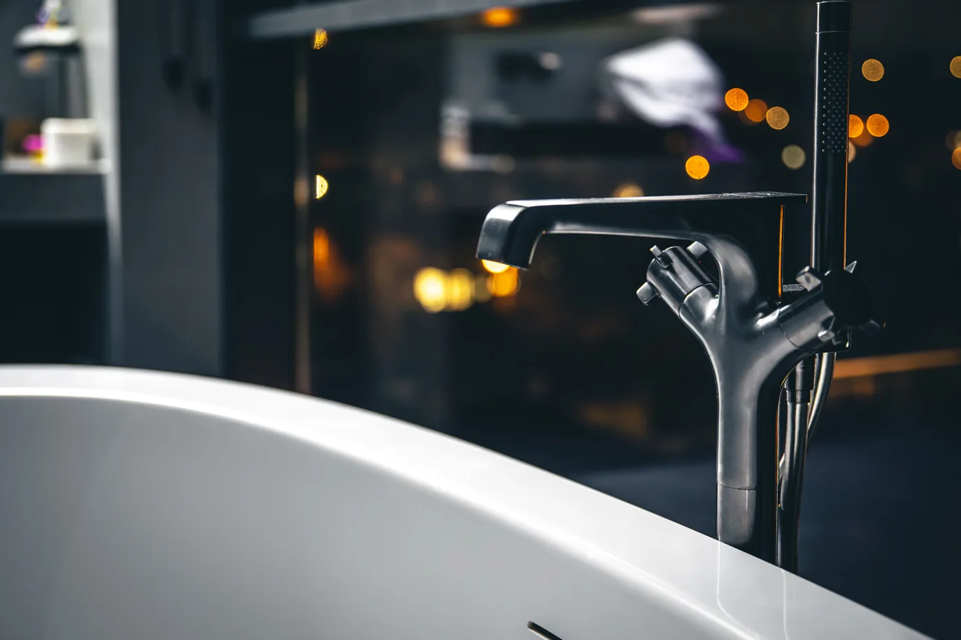 Chrome bath mixer beside a window illustrating 24-hour plumber Kempton Park support