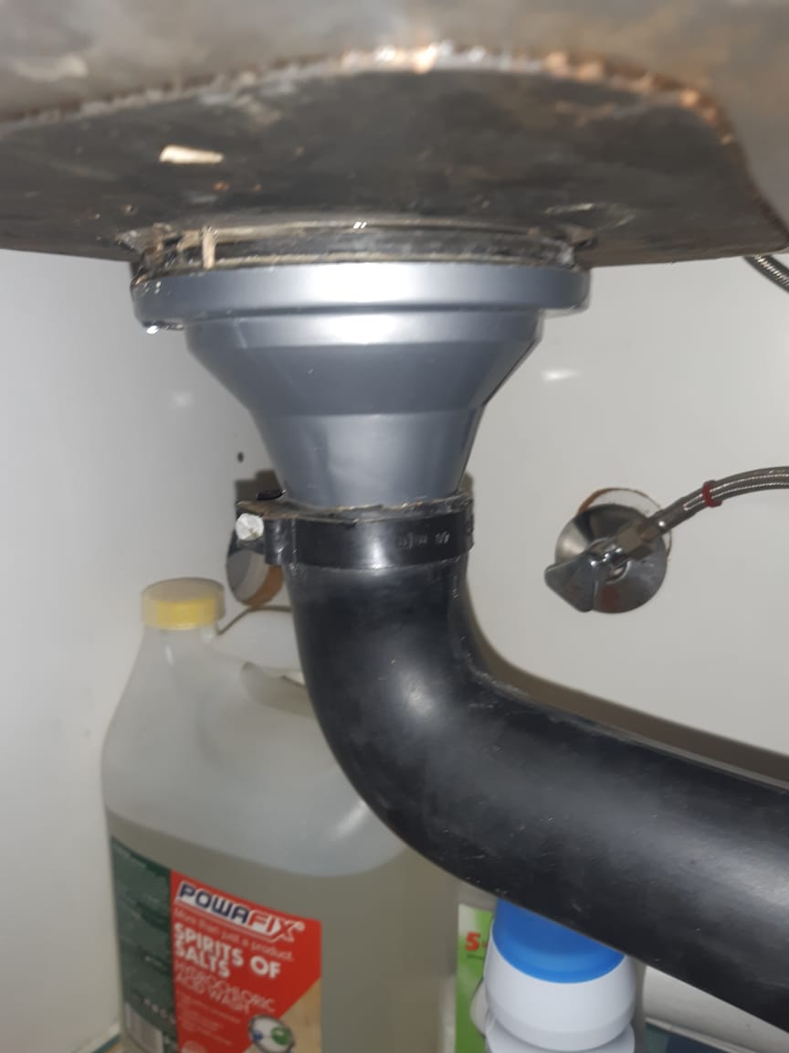 Sink waste trap connection repaired in a Boksburg kitchen