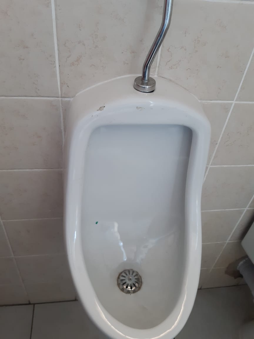 Commercial urinal plumbing repair completed in Waterkloof Park