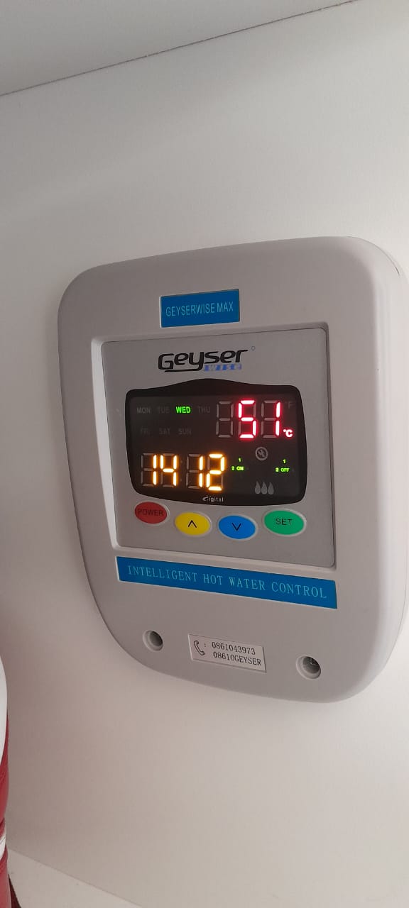 Geyser timer and controller settings checked during hot water repair in Waterkloof Park