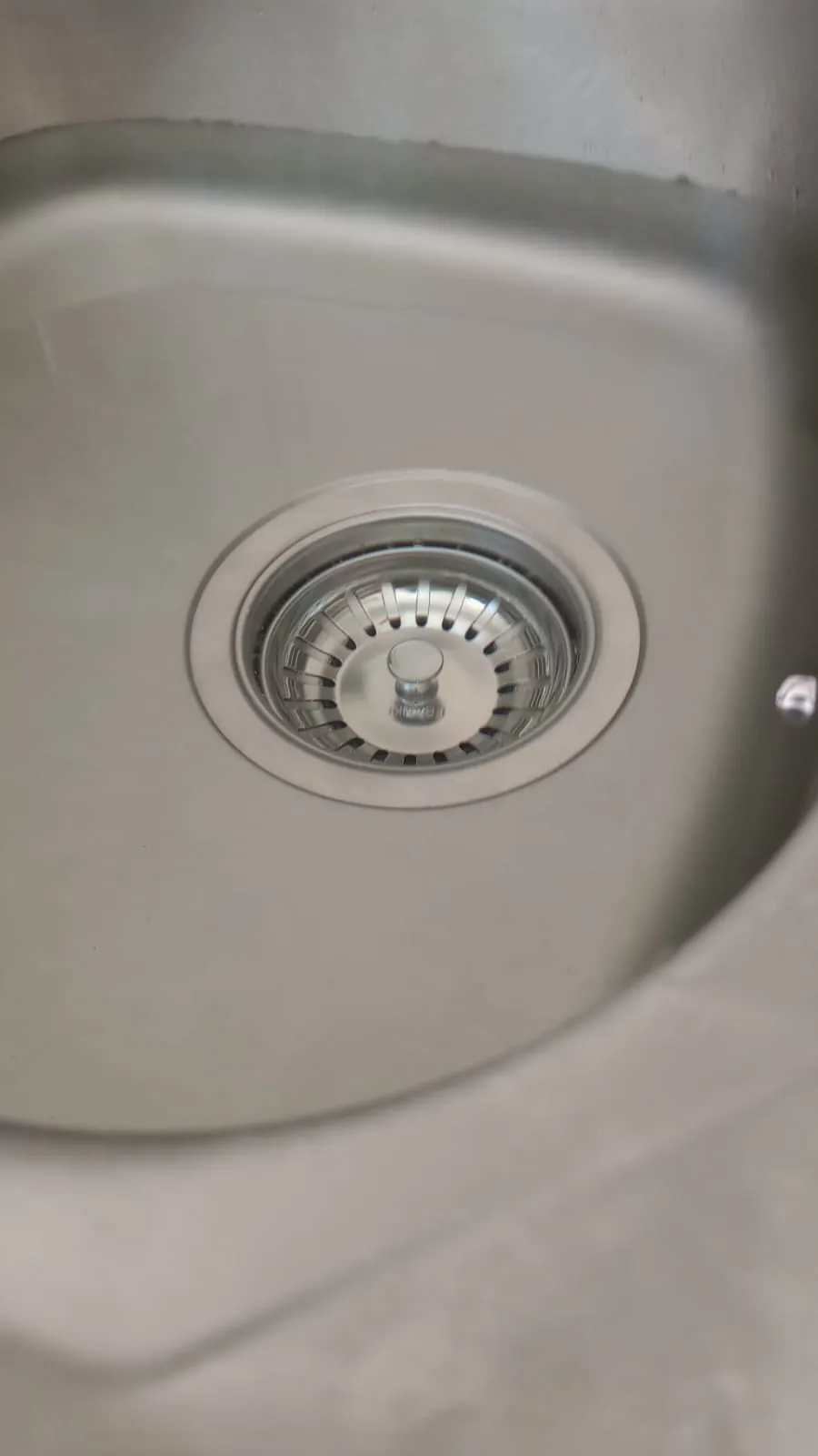 Kitchen sink drain cleaned after slow water flow