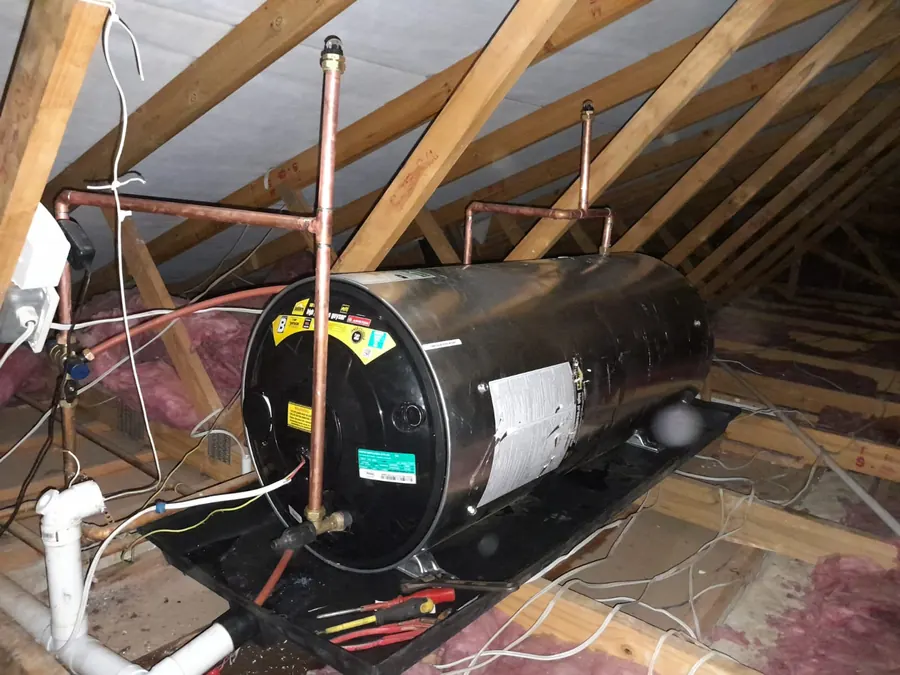 Roof space checked before a new geyser is installed with safe support and drainage