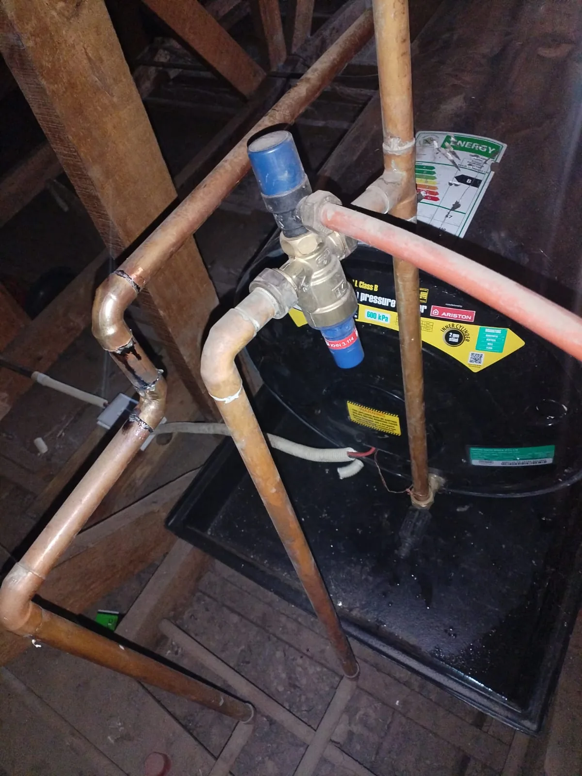 Pressure control valve assembly fitted to protect a replacement geyser