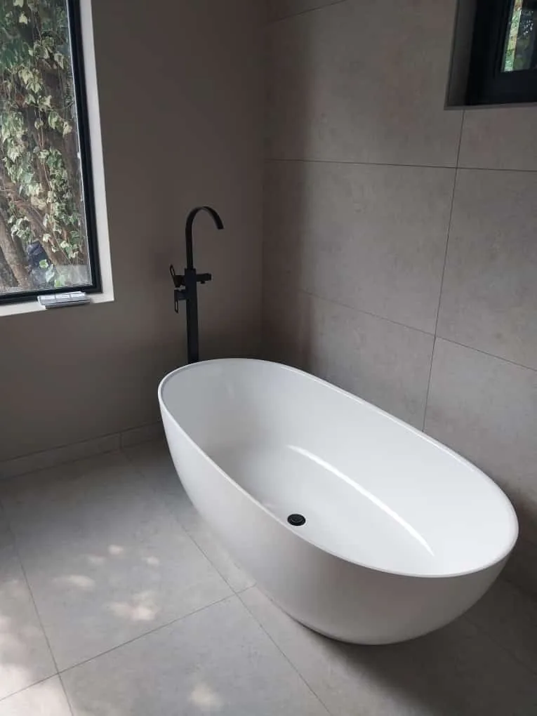 Bath waste outlet where slow draining can indicate a blocked bath trap