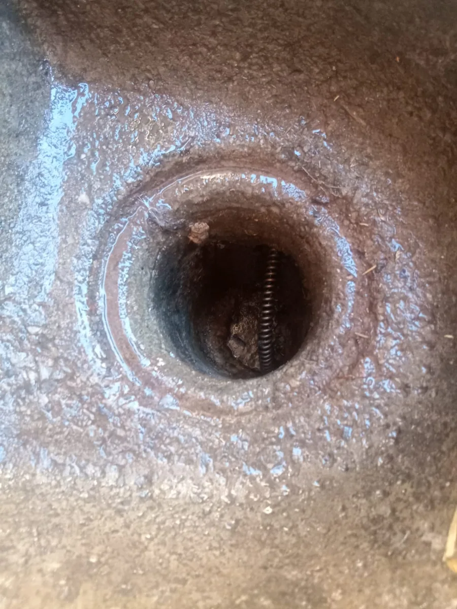 Blocked rodding eye access point used during drain cleaning