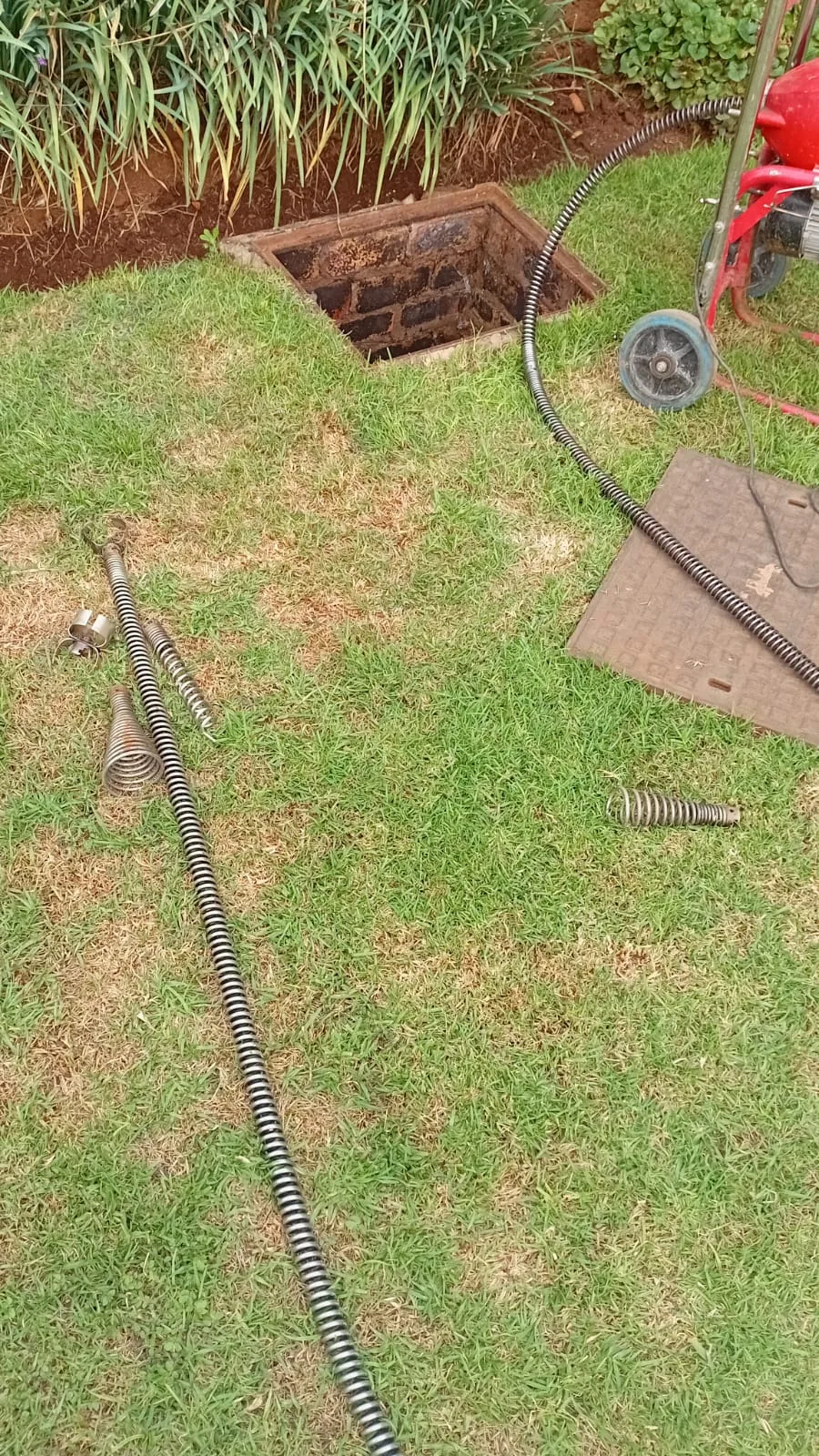 Professional drain cleaning machine and cables used for stubborn sewer blockage