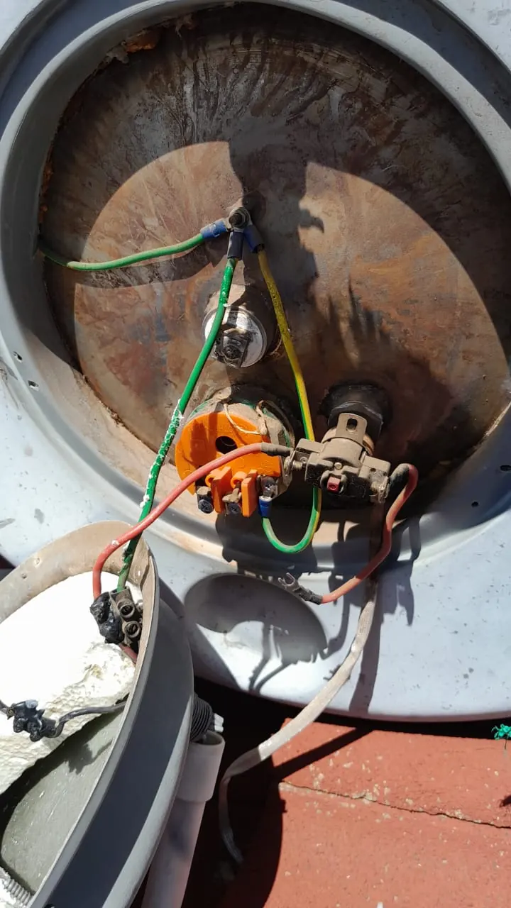No hot water from the geyser Open geyser electrical cover showing thermostat and wiring for no hot water fault finding