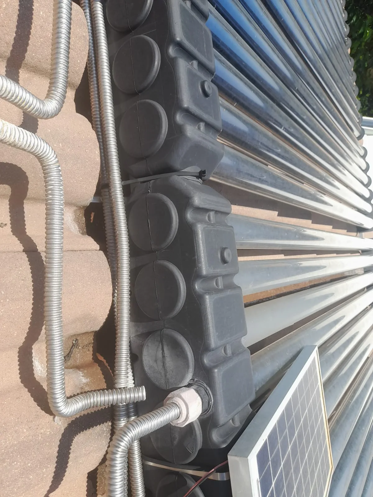 solar geyser evacuated tube collector with pipework and roof conversion requirements