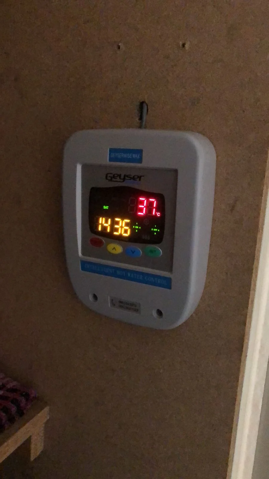 GeyserWise controller display showing water temperature and timer settings