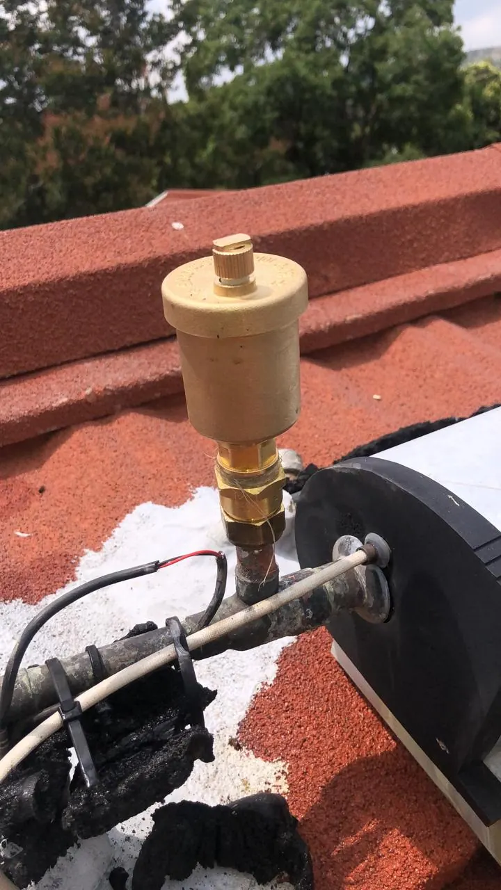 Air release valve fitted to solar geyser pipework on a roof
