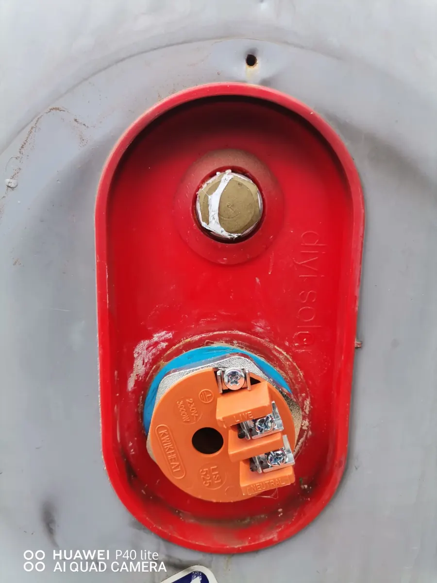 Open solar geyser electrical cover showing element and thermostat wiring