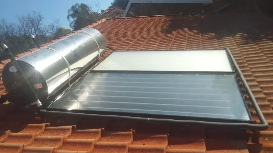 Solar geyser repair and maintenance work on rooftop hot water system