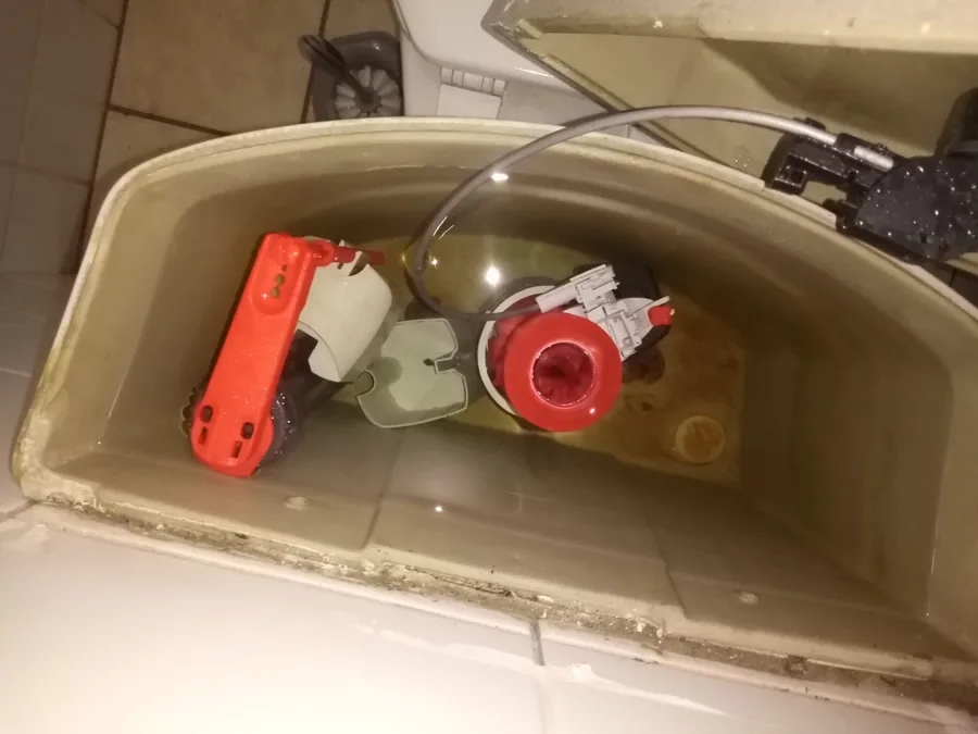 Toilet flush valve and seal replacement inside cistern