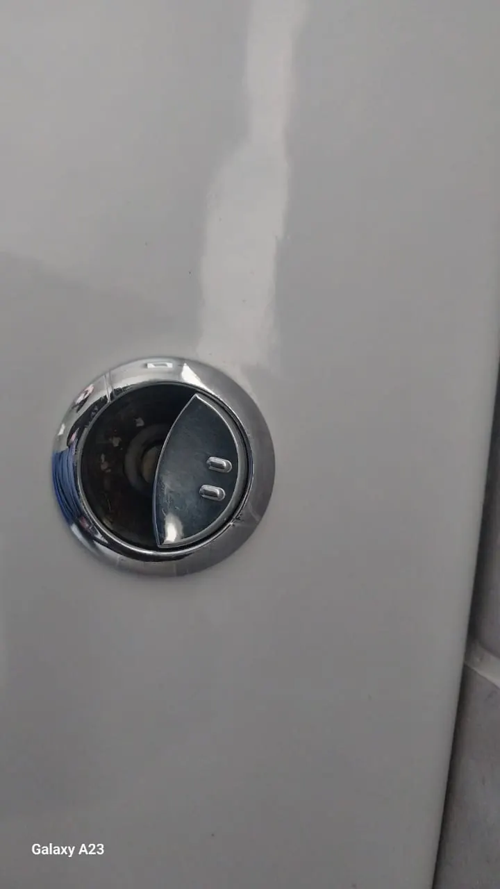 Open toilet cistern with flush valve and inlet valve checked