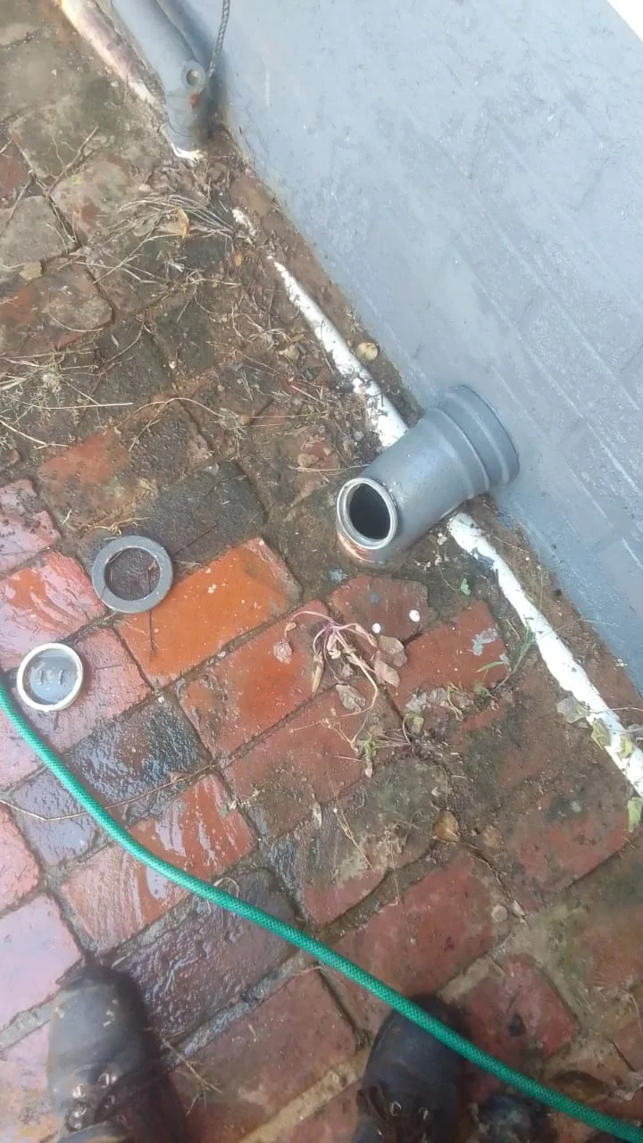 Drain access pipe showing build-up that can cause repeat drain blockages