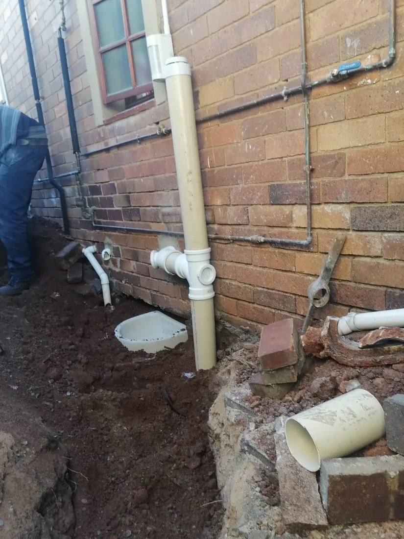 Outside drain and waste pipe installation with new vertical pipework in Zandvlei