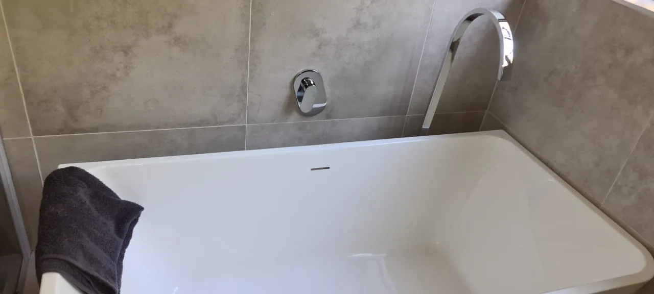 Modern bath mixer and bath plumbing installation work in Zeekoevlei