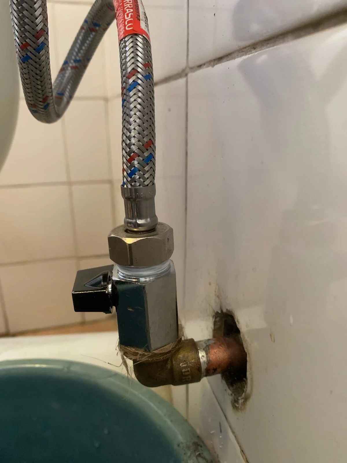 Close view of leaking basin control valve in Karenpark