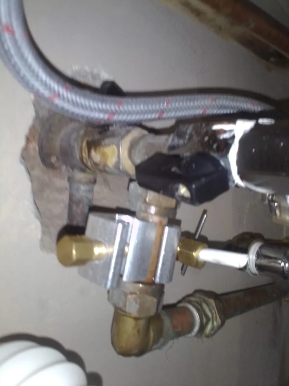 Plumber repairing an active underground water leak