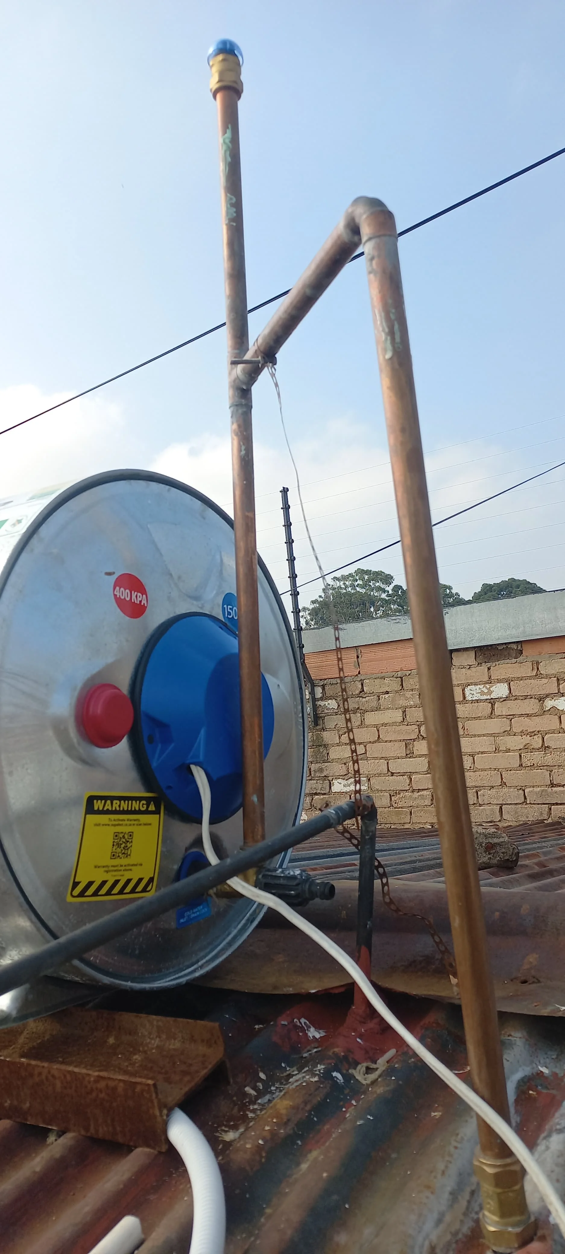 Electric geyser installed safely in a roof space