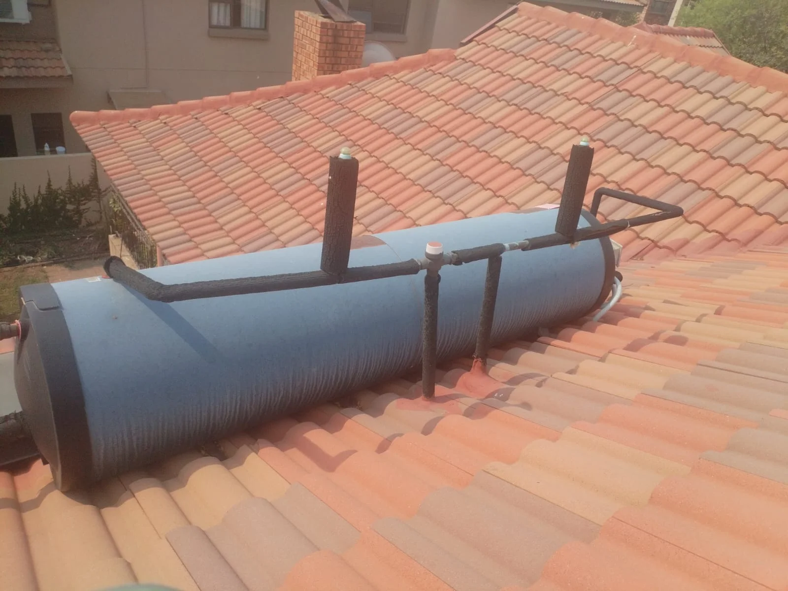 Electric geyser installed safely in a roof space