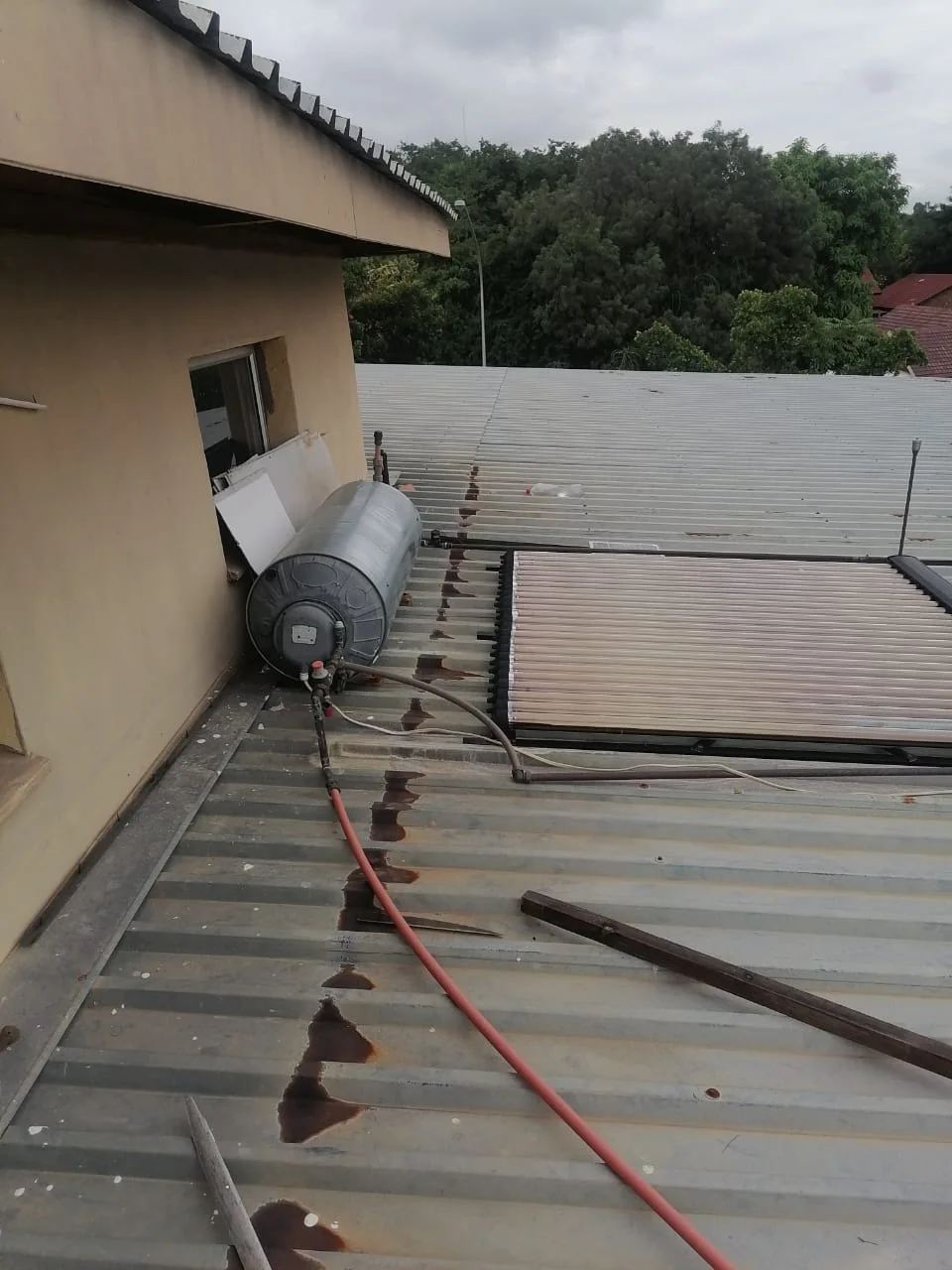 Electric geyser installed safely in a roof space