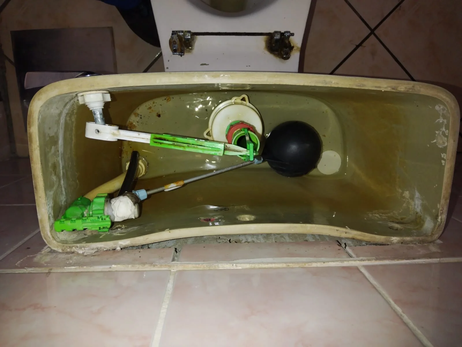 Toilet cistern and connector repair