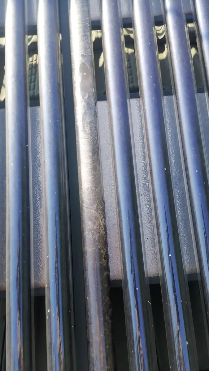 close view of evacuated solar tubes inspected by trusted solar geyser plumbers