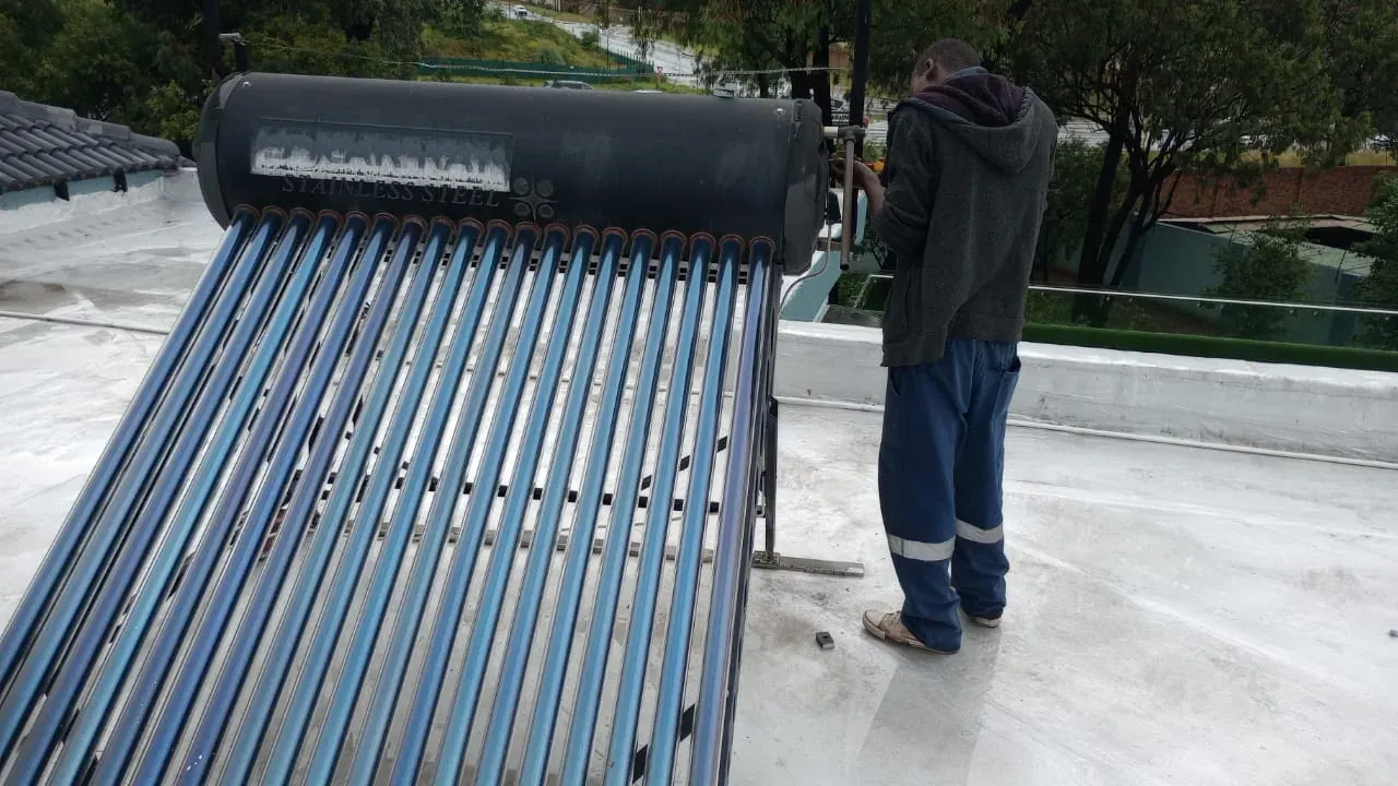 technician completing a professional 200 litre solar geyser installation