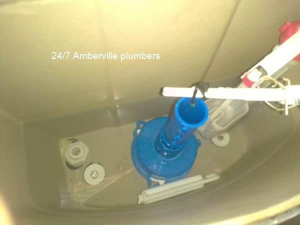 All hour plumbers in Amberville repairing a plumbing system