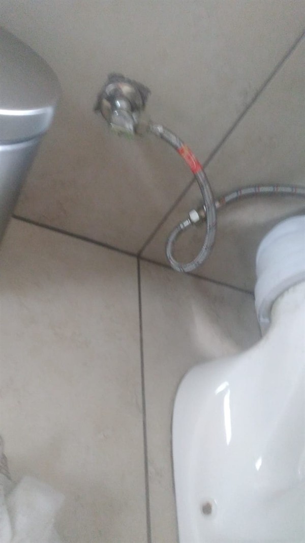 Wet base from leaking toilet flexi pipe in Barbeque