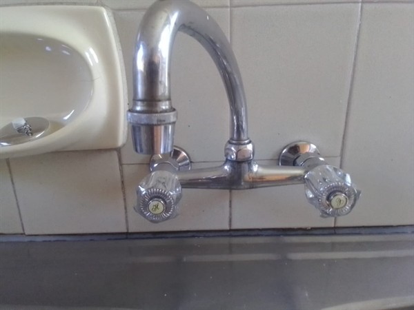 Open geyser showing heating element and thermostat repair work in Lambton Gardens with exposed wiring and internal components