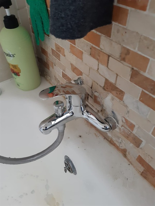 Open geyser showing heating element and thermostat repair work in Van Dykpark with exposed wiring and internal components