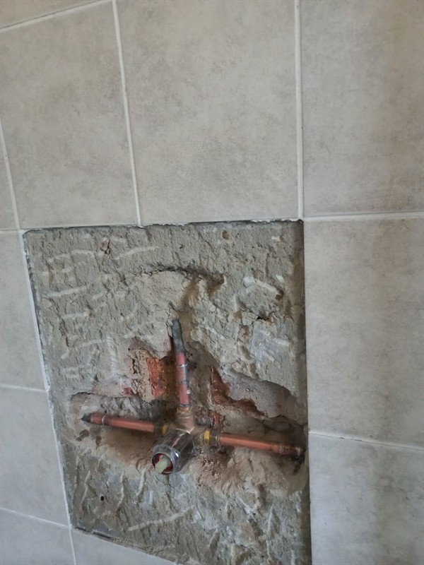 Burst pipe inside wall causing water leak in Beyers Naude