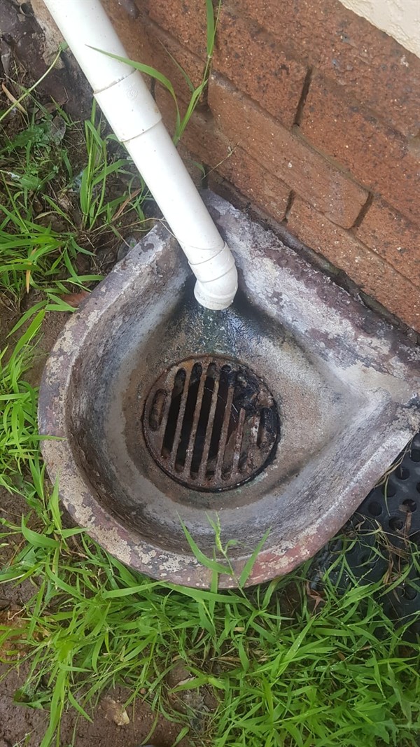 Slow drain pipe with significant water pooling