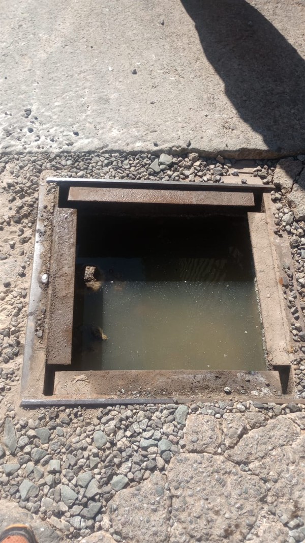 Blocked drain pipe being prepared for full unblocking