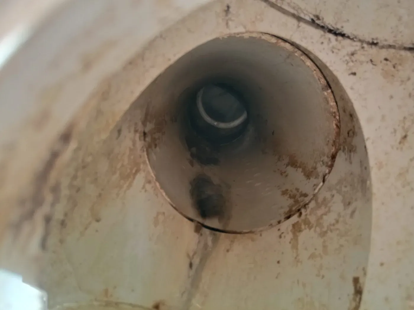 Damaged external drainage pipework contributing to blocked drain problems