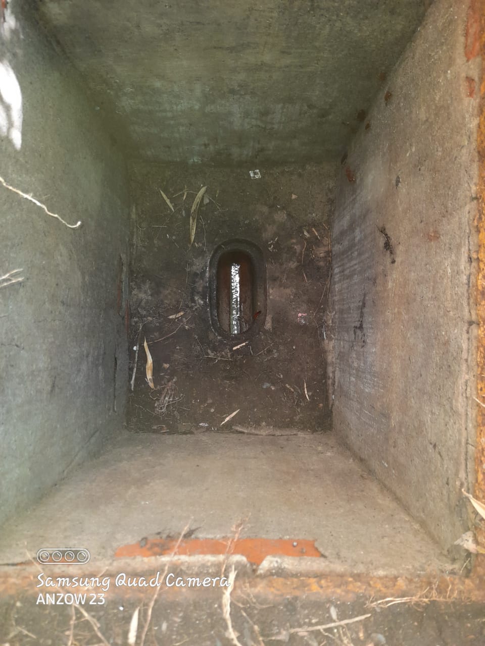 Blocked sewer inspection chamber in Randpark Ridge showing debris buildup and restricted main drain line causing multiple drain backups before professional sewer cleaning restored flow