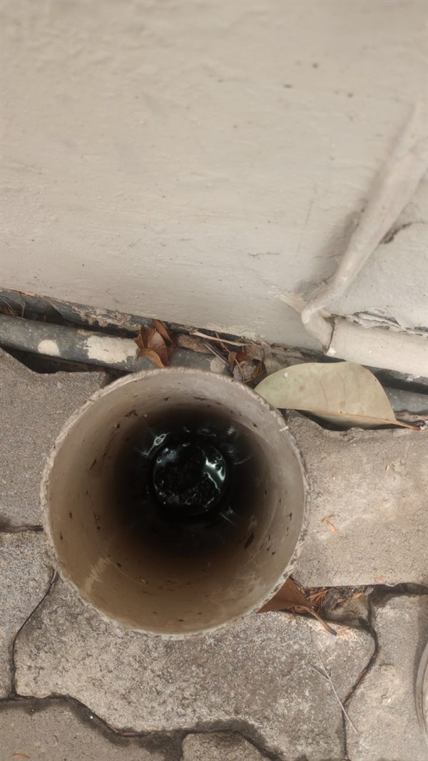 Technician repairing open geyser element and thermostat in Huddle Park Golf Course with exposed wiring and heating components