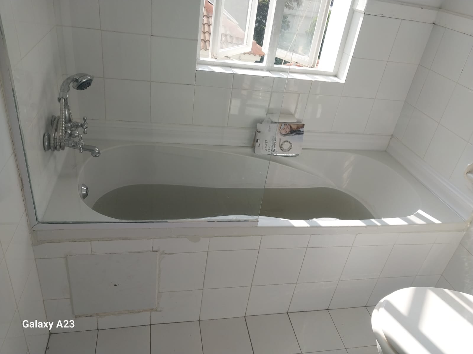 Leaking P-trap under kitchen sink repaired in Blairgowrie, showing under-sink plumbing with new sealed connections and drainage pipe after fixing leak and restoring proper water flow.