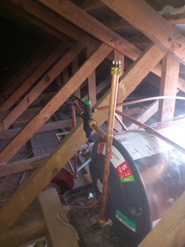 Badly flooding cupboard from burst geyser in Weskoppies