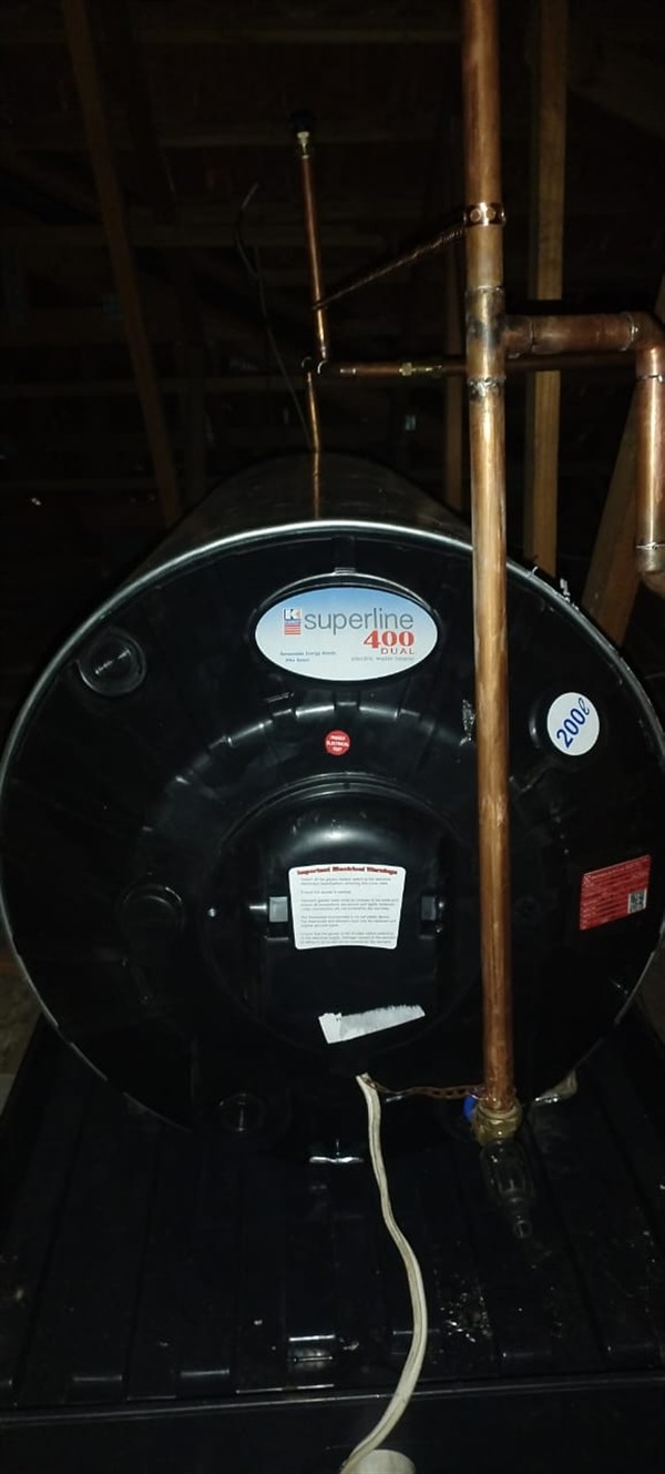 Badly flooding cupboard from burst geyser in Darrenwood Park