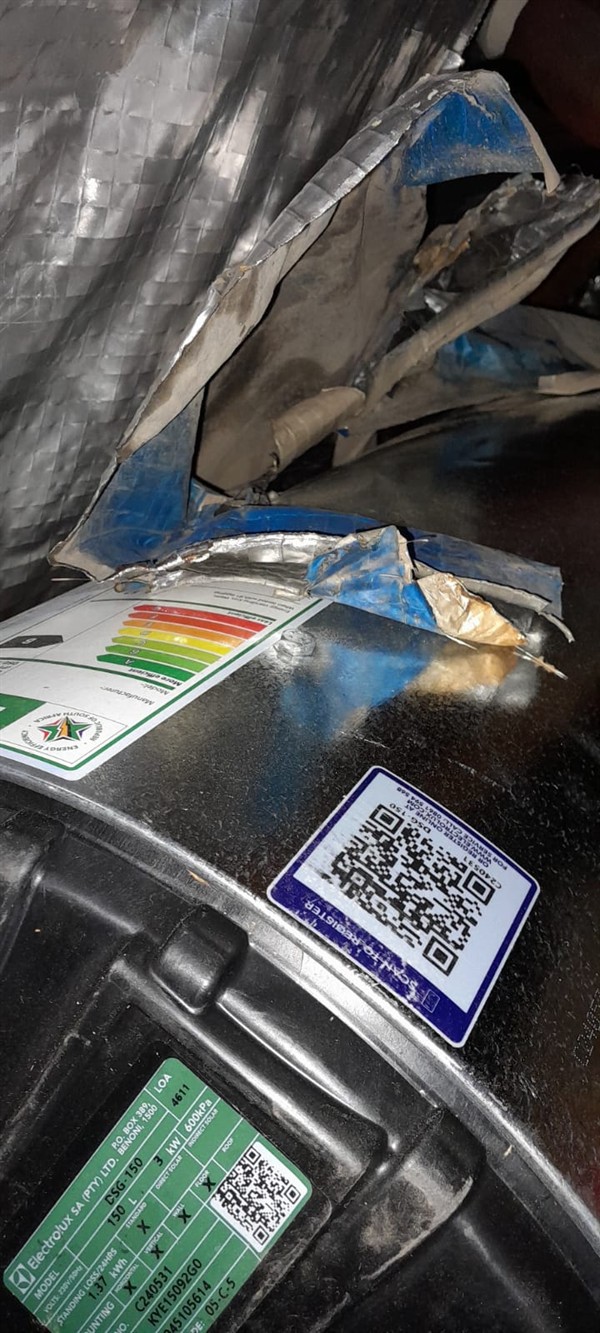 Badly flooding cupboard from burst geyser in Tiegerpoort