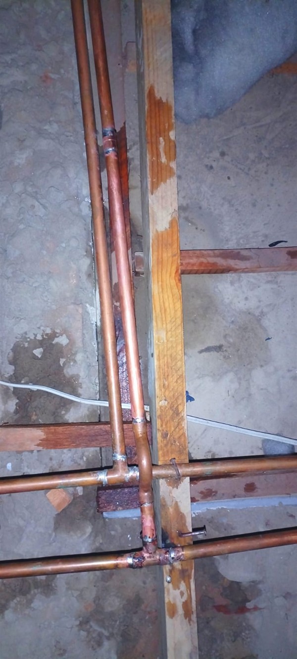 Ceiling damage from burst pipe leak in Noordhang